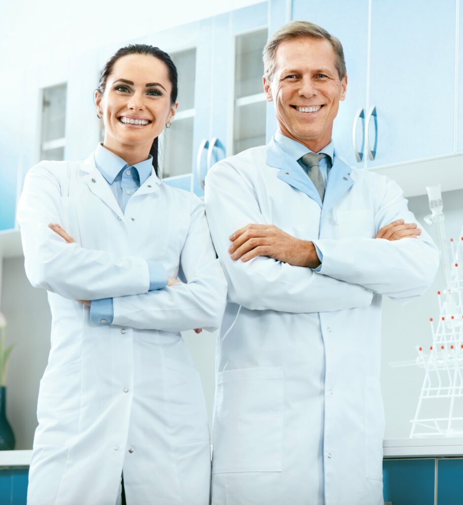 two-scientists-posing-in-a-laboratory